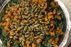 kale salad with butternut squash, shallots and pepitas