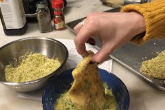 dip the chicken in pistachio crumbs with chopped herbs