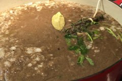 onion soup simmering with bouquet garni