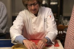 rolling out the dough for a tart