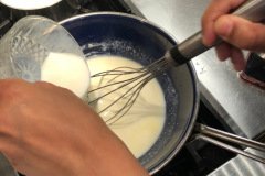 Adding milk for bechamel sauce