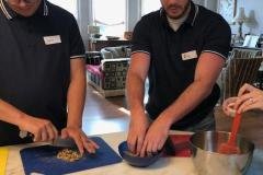 chopping walnut for spicy walnuts