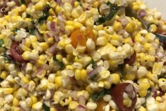 fresh corn salas with chiffonade of basil and tomatoes. A little apple cider vinegar to add some acid.
