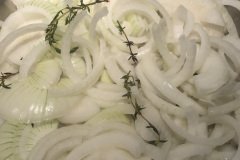 onions starting with thyme sprigs