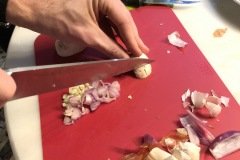 chopping shallots and garlic