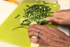 chopping leeks for risotto