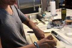 shaving parmesan cheese for porcini mushroom sauce