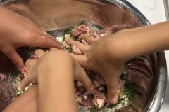 mixing the meat for sliders