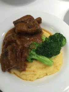 Braised short ribs with polenta and broccoli
