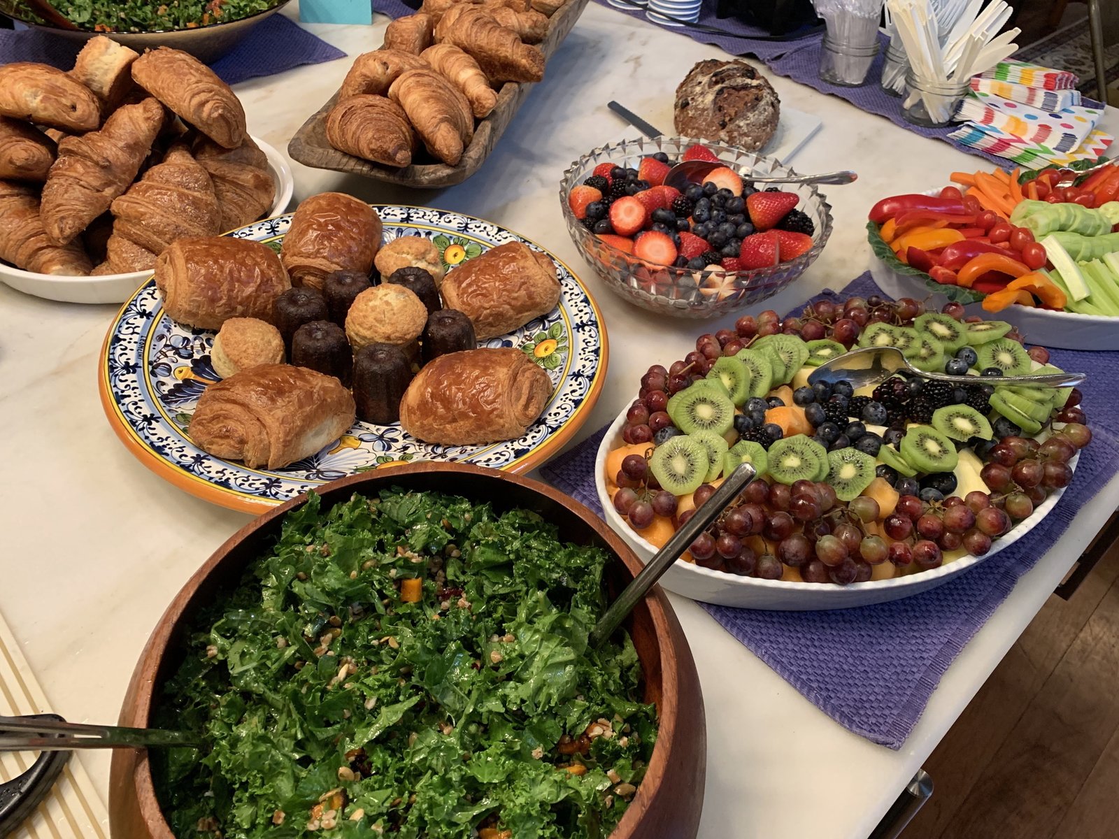 Kale salad with Pepitas and roasted butternut squash, fresh fruit and pastries